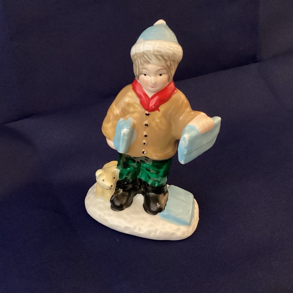 Small porcelain character for a Christmas village